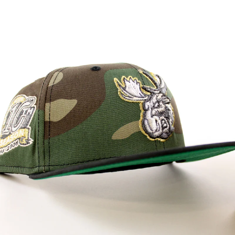 MANITOBA MOOSE 10TH SEASON AMERICAN HOCKEY LEAGUE New Era 59Fifty Fitted Hat (WoodLand Camo Black Green Under Brim)